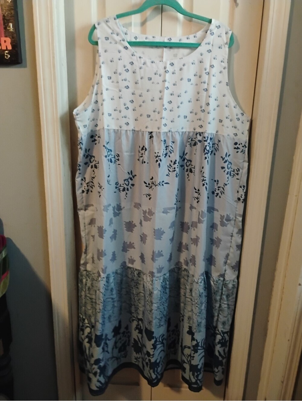 Sleeveless Blue and White Floral Midi Dress with Pockets